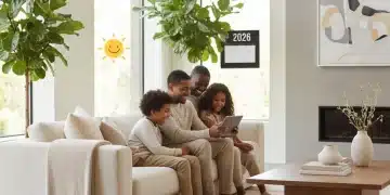 Family looking at tablet, symbolizing future financial planning with Child Tax Credit 2026
